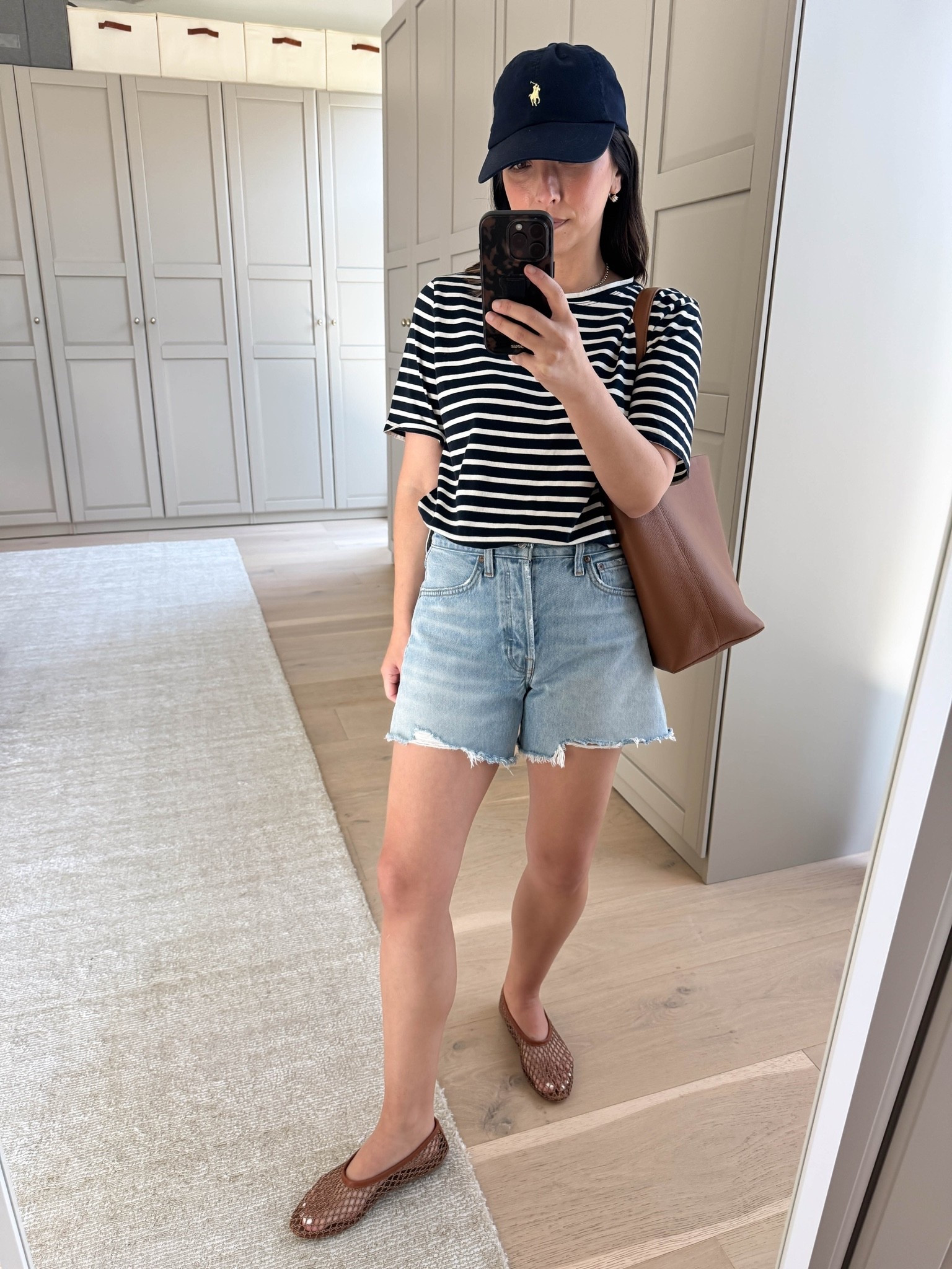 A no-layer warm weather outfit idea. All of these are wardrobe staples that I wear over and over again. 

Kule tee medium
Agolde Parker shorts 25
Staud flats 35
Quince bucket bag
Polo hat
Electric Picks earrings
Dorsey James necklace 15”

#LTKootd #LTKmomlife #LTKPetite