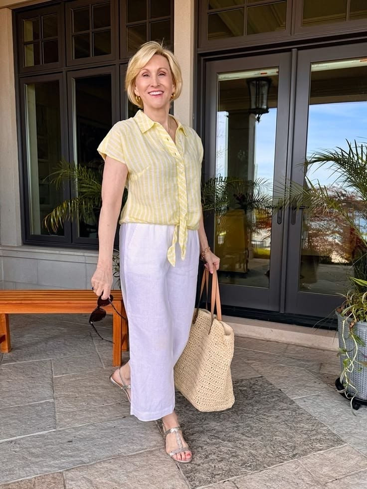 There’s something about a linen outfit that instantly makes me think of sunshine and slow, easy days. ☀️🤍

This yellow and white striped collared linen shirt paired with white linen pants is such a fresh, timeless combination. Add a pair of silver sandals, and you have an outfit that’s effortlessly chic without feeling overdone.

I love looks like this because they’re comfortable, breathable, and so easy to wear—whether you’re heading out for brunch, exploring a new town on holiday, or simply enjoying a beautiful summer day.

#LTKSeasonal #LTKOver40 #LTKootd