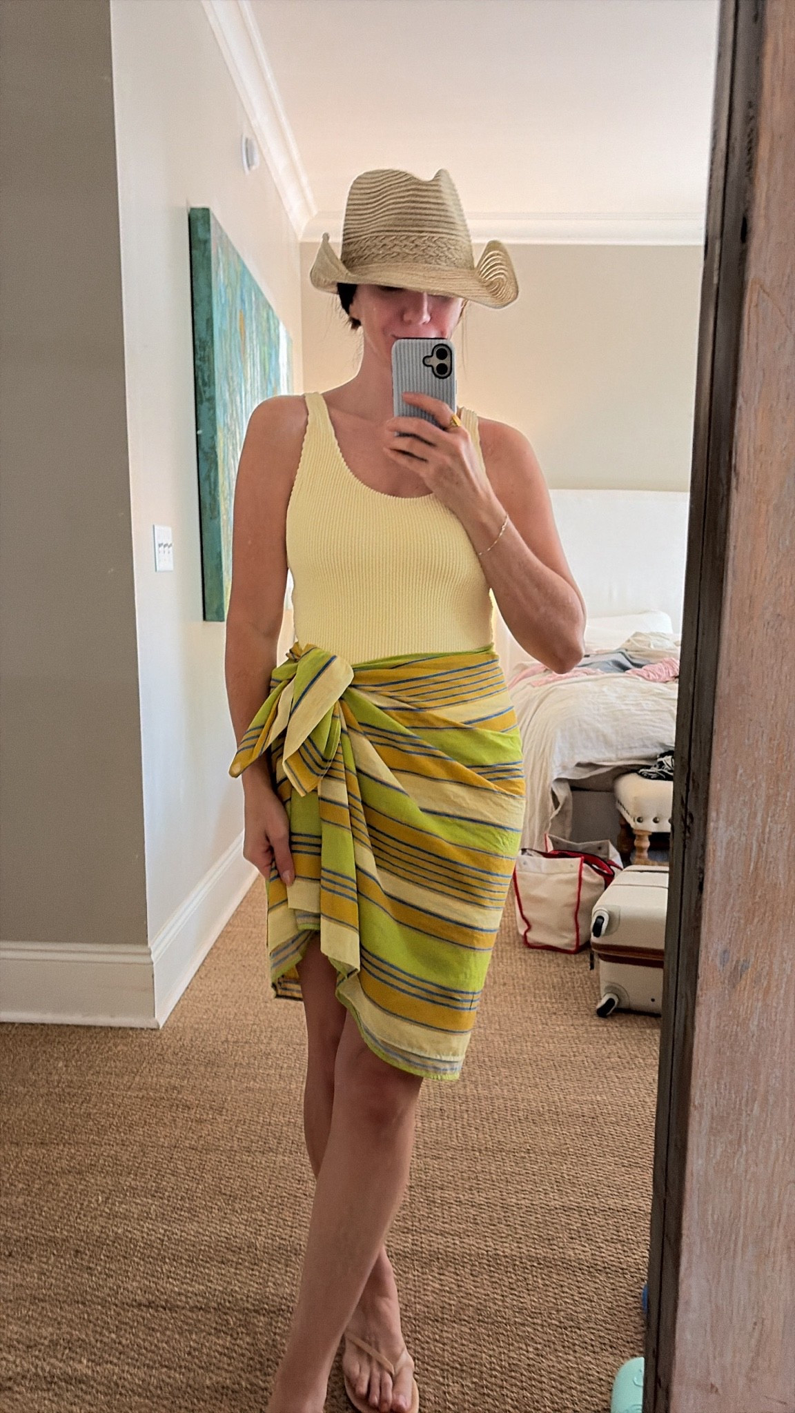 Today’s swim look 

Hunza G swim lookalike and colorful wrap sarong. Hat is from a local shop, since I seemed to have lost mine before we even got to the beach 🤪￼￼