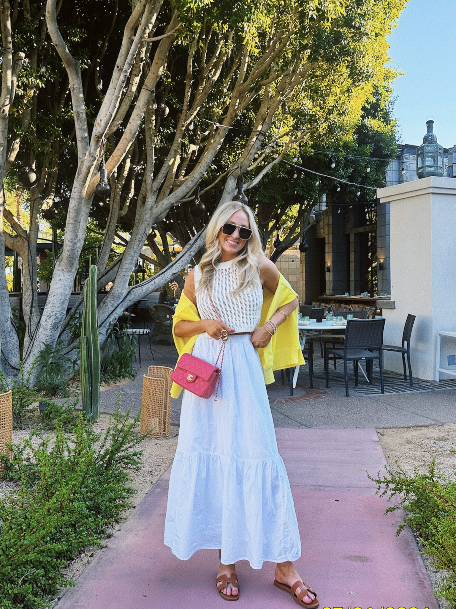 Summer outfit idea! Perfect for a summer vacay or summer date night/dinner out! Skirt runs tts and has a stretchy waistband, linked the top and other options along with the sweater over my shoulders and sandals run tts! 

#LTKSeasonal #LTKSummerSales #LTKSaleAlert