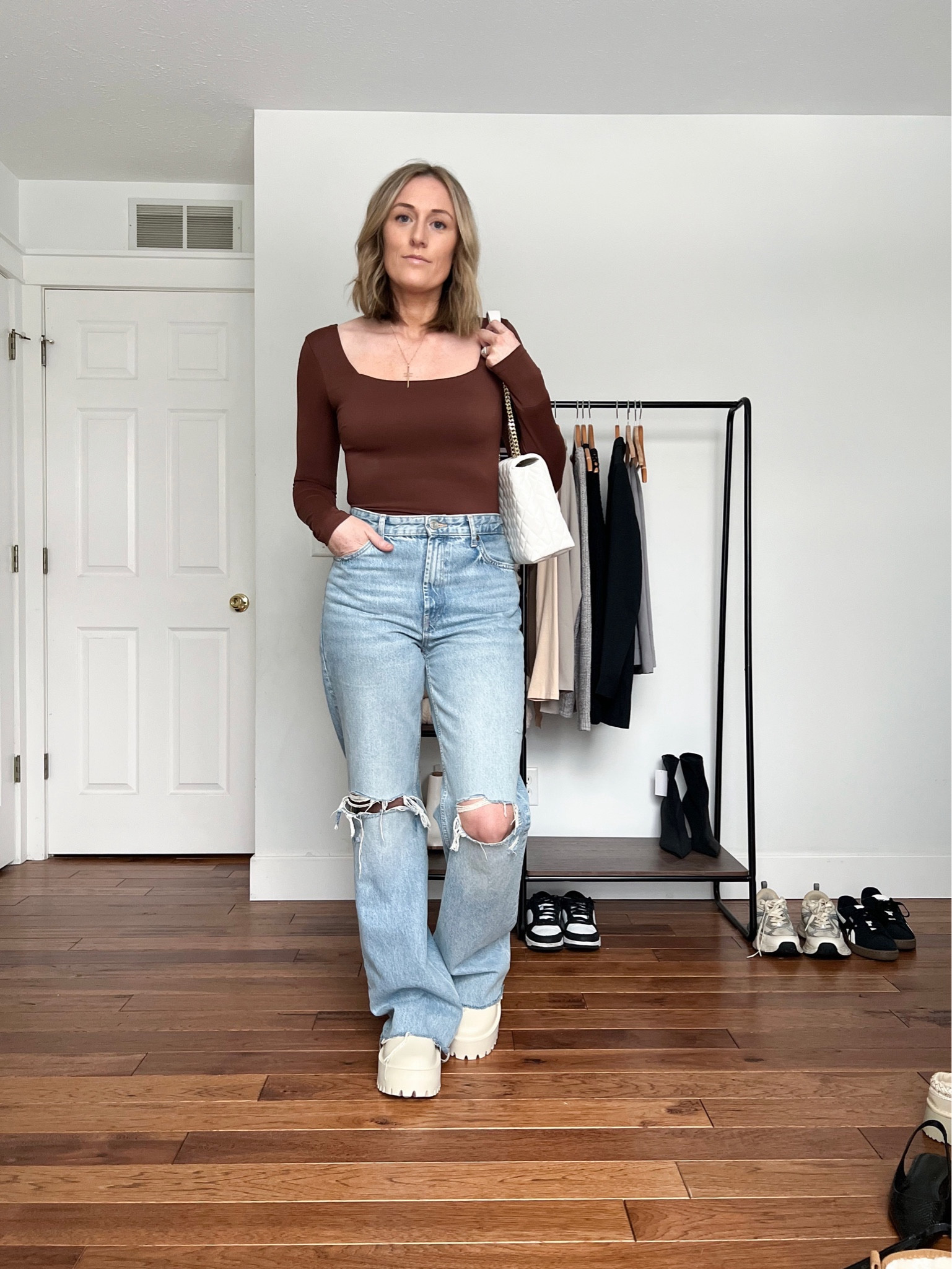 Winter outfits. Winter outfit idea. Casual outfits. Casual outfit idea. Long sleeve bodysuit. Chocolate brown bodysuit. Square neck bodysuit. Wide leg jeans. Baggy jeans. Clunky clogs. Heel clogs. Chunky clogs. Neutral outfits. Mom outfits. 

#LTKfindsunder50 #LTKSeasonal #LTKfindsunder100