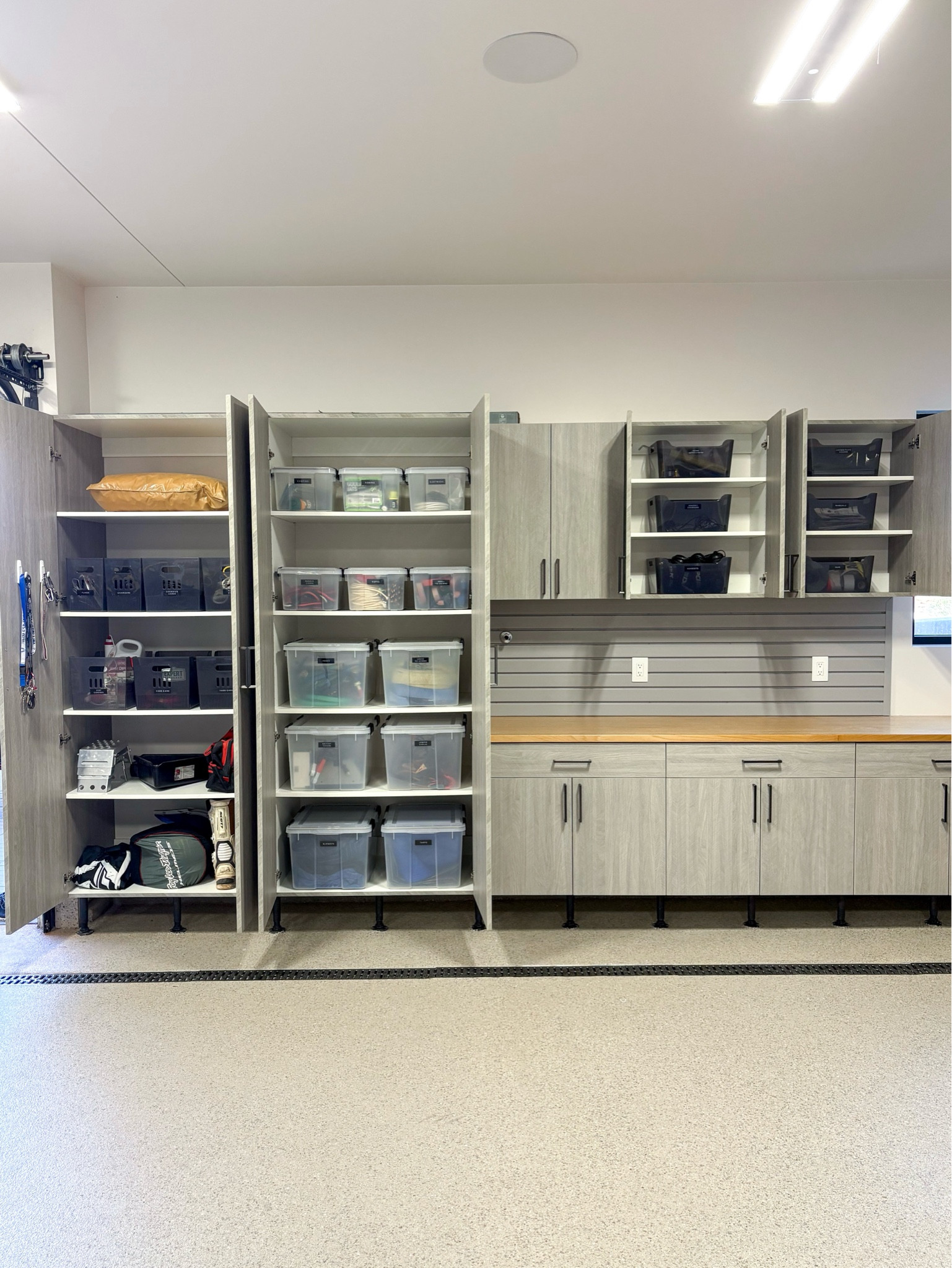 We set up the cabinet by the garage door as a grab-and-go station for keys, riding gear, and lawn/pest control.