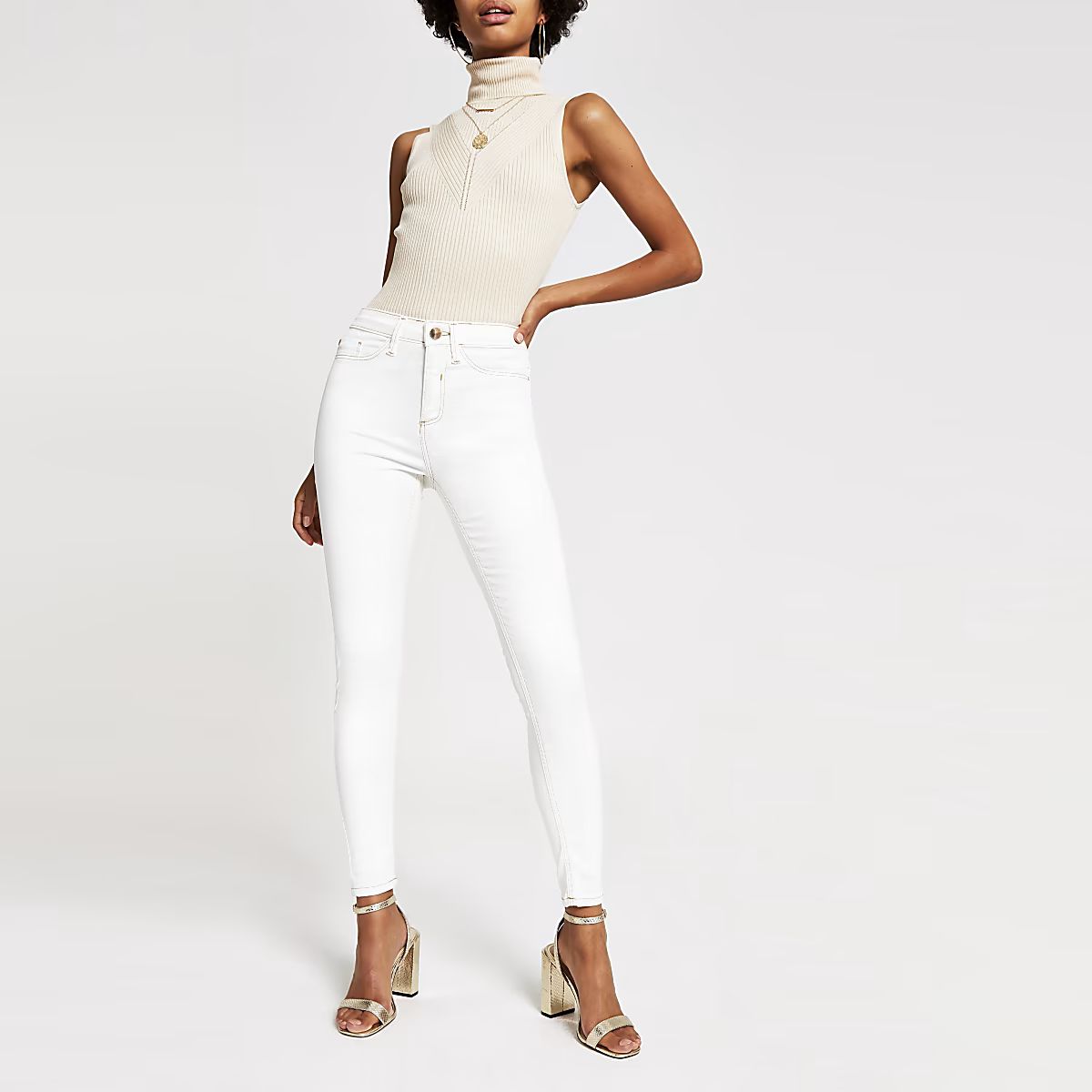 Off white Molly coated mid rise jeggings | River Island (UK & IE)