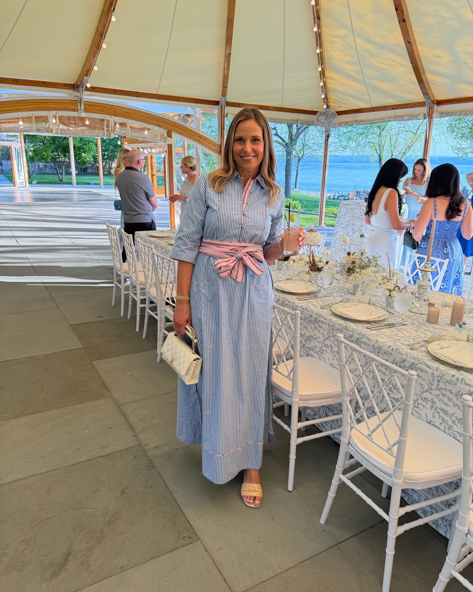 This dress is so pretty! I love the pink details throughout and the adjustable sash that ties into a bow. I will be wearing this to several events this summer.  s

#LTKOver40 #LTKMidsize #LTKdayinmylife