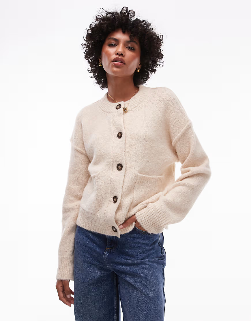 Topshop knitted relaxed exposed seam crew cardi with pockets in cream-White | ASOS (Global)