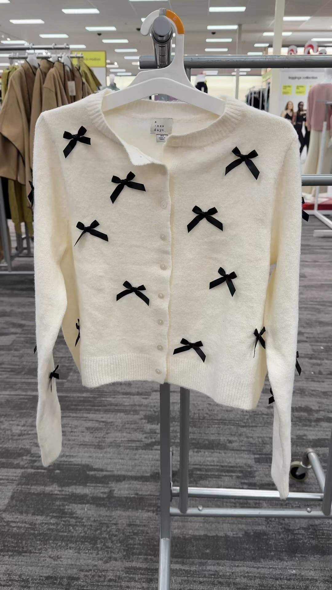 This new bow cardigan at Target is such a charming find for the season! 🤍🖤 The cream sweater with dainty black bows feels sweet, feminine, and perfectly festive — and it also comes in a gorgeous red that works for Christmas and Valentine’s Day. A pretty, classic piece that dresses up any outfit effortlessly. Linked a few more bow cardigans and sweaters for the season! ✨🎀 #TargetFinds #HolidayOutfitI #BowCardigan

#LTKFindsUnder50 #LTKPetite #LTKHoliday