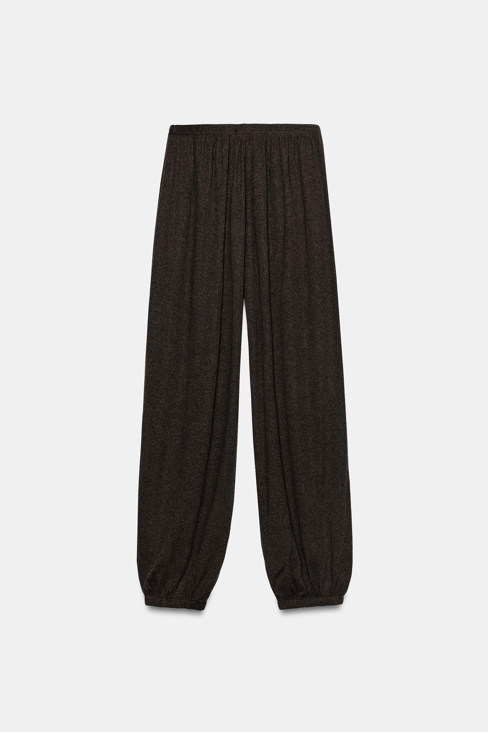 Model height: 173 cmMid-waist trousers with an elastic waistband and elastic cuffed hems. | Zara UK