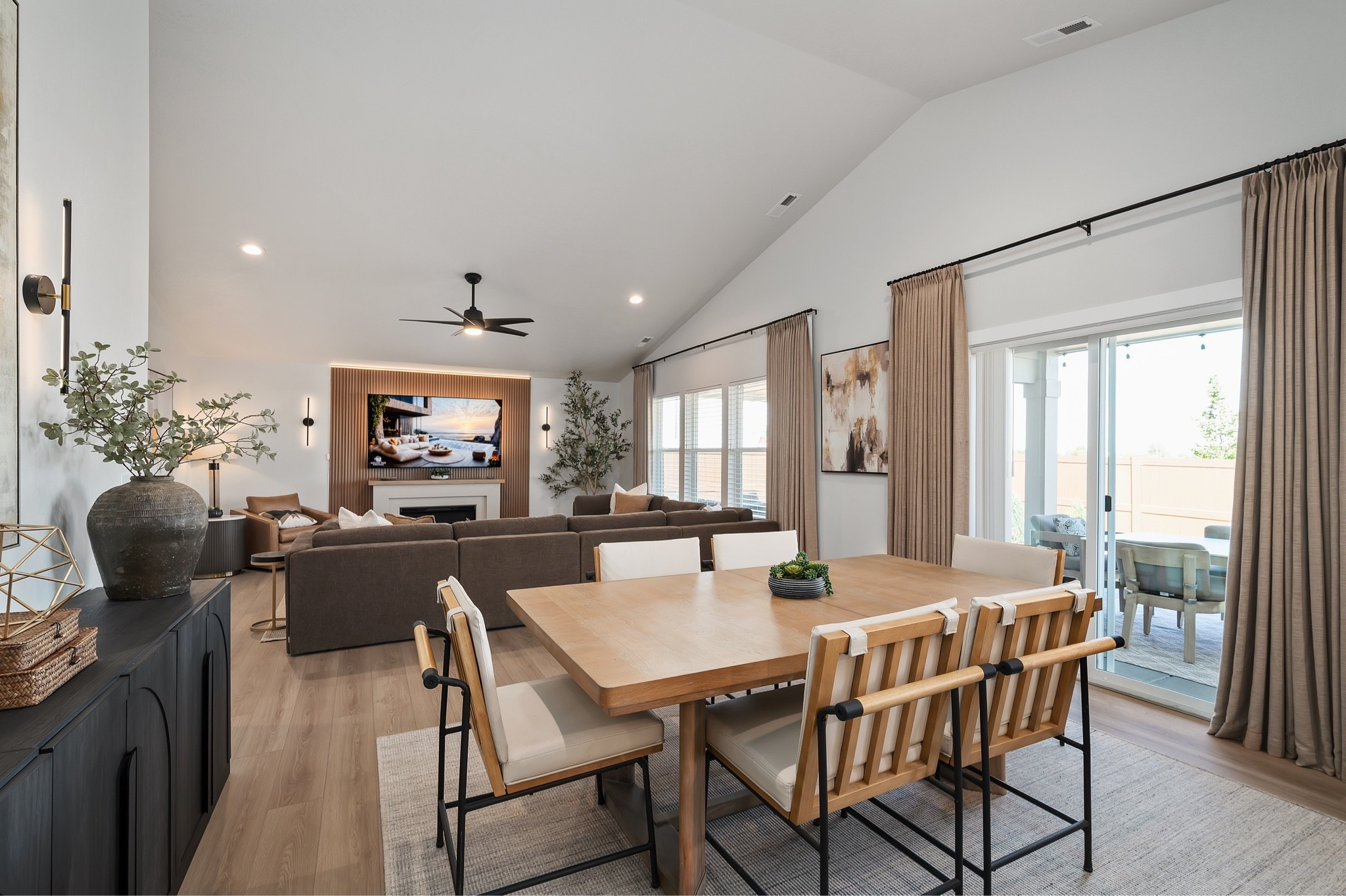 This dining and living space has such a warm, layered feel. The natural wood tones, soft neutral textiles, black accents, and oversized greenery create a beautiful modern organic look that feels both polished and comfortable.

The styling is simple but intentional, with each piece adding warmth and texture without making the space feel busy.
@Wayfair 
@Walmart 
@Lowe's 
@Target

#LTKSaleAlert #LTKU #LTKHome