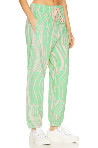 adidas by Stella McCartney True Casuals Sweatpant in Screaming Green & Blush Pink from Revolve.co... | Revolve Clothing (Global)