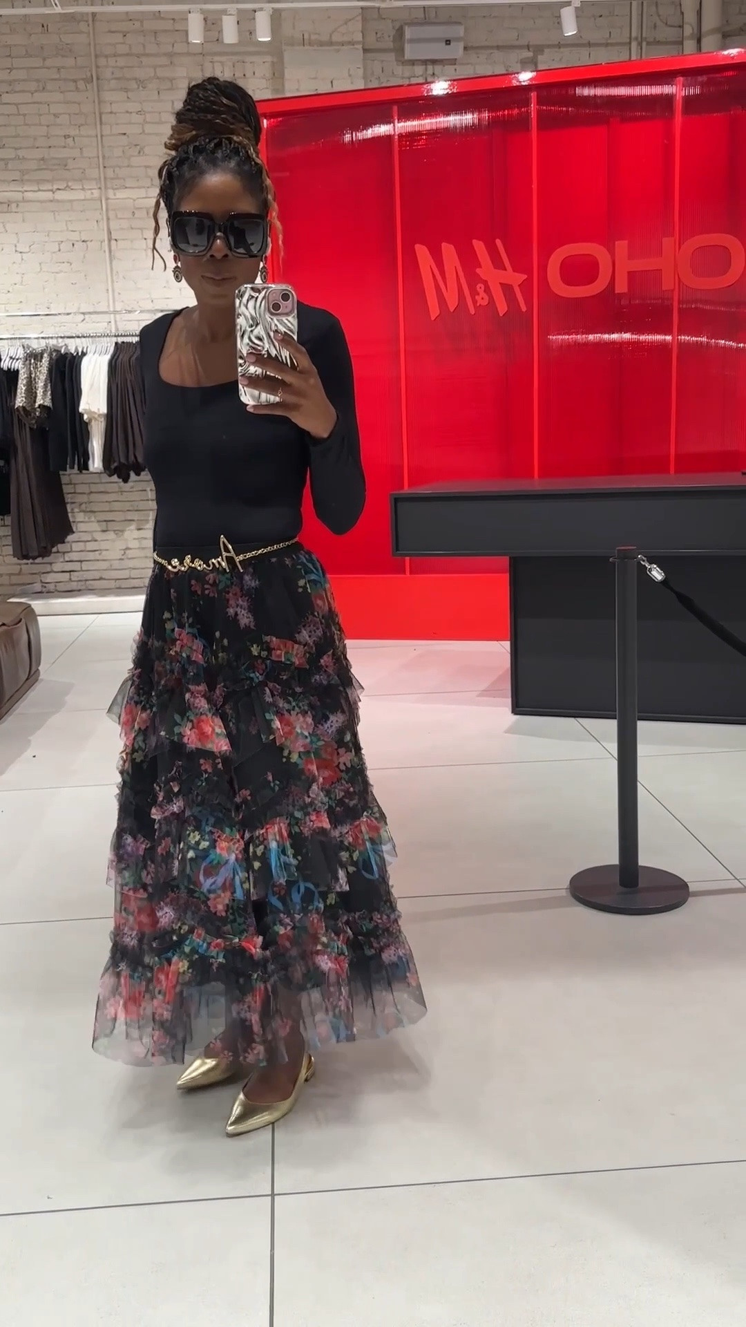 Flashback Friday to one of my New York Fashion Week looks last month. I still love how this floral skirt moved and how the black bodysuit and gold accessories kept everything feeling simple but still special.

This was one of those outfits that felt feminine, fun, and very me.

I added the full look below if you want to take a closer look.