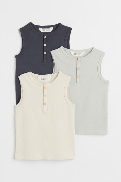 Kids Exclusive. Sleeveless shirts in soft, cotton jersey with a button placket. Ribbing at neck a... | H&M (US + CA)