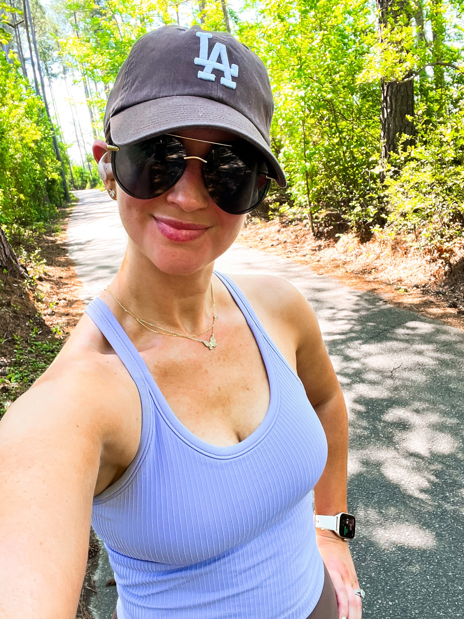 Purple Sports bra tank top-wearing the size 4
Chocolate brown LA ball cap hat
Black and gold aviator sunglasses 
White and gold amazfit workout watch 
Beats earbuds 



#LTKfitness