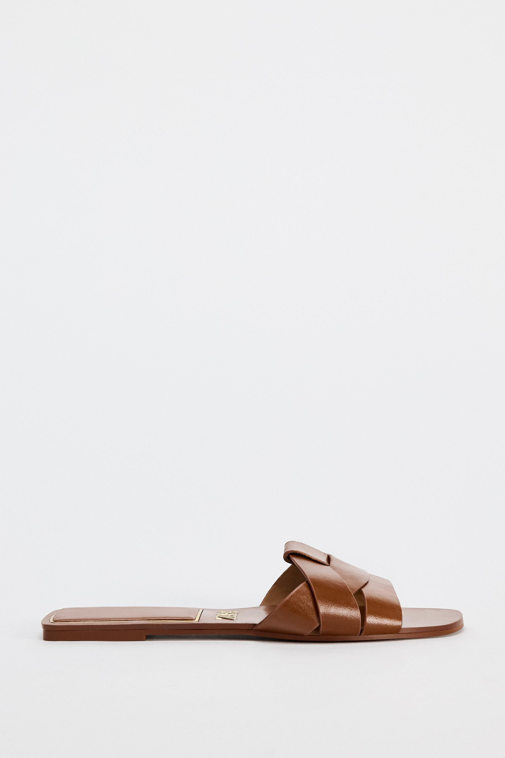 FLAT CROSSED LEATHER SANDALS | Zara US
