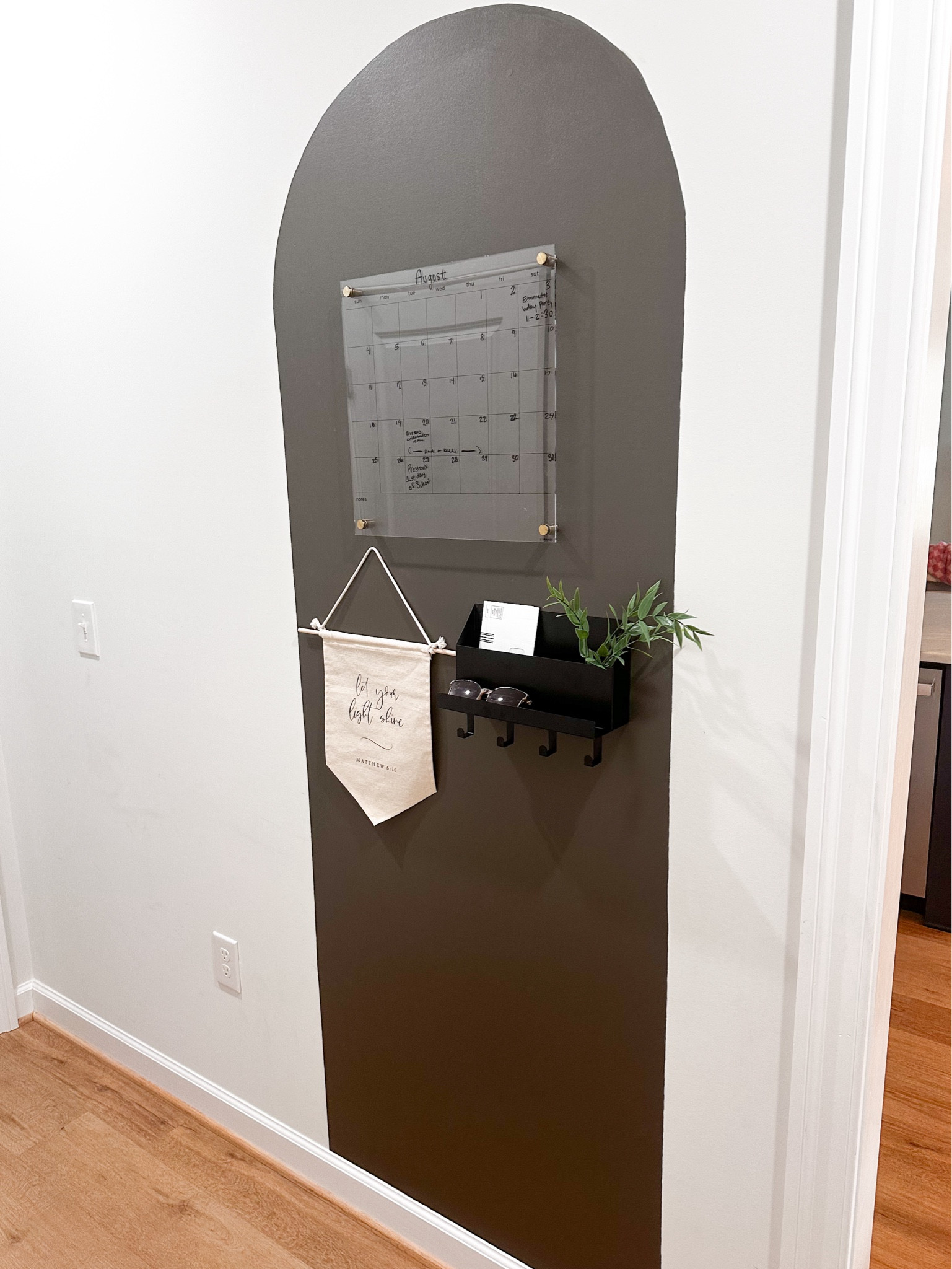 modern + functional family command center 🗓️ 
DIY wall ✔️
Acrylic calendar ✔️
Metal entry way organizer ✔️ 
Cute sign with encouraging verse ✔️
Paint color - SW Urban Bronze 

#LTKFamily #LTKHome #LTKKids