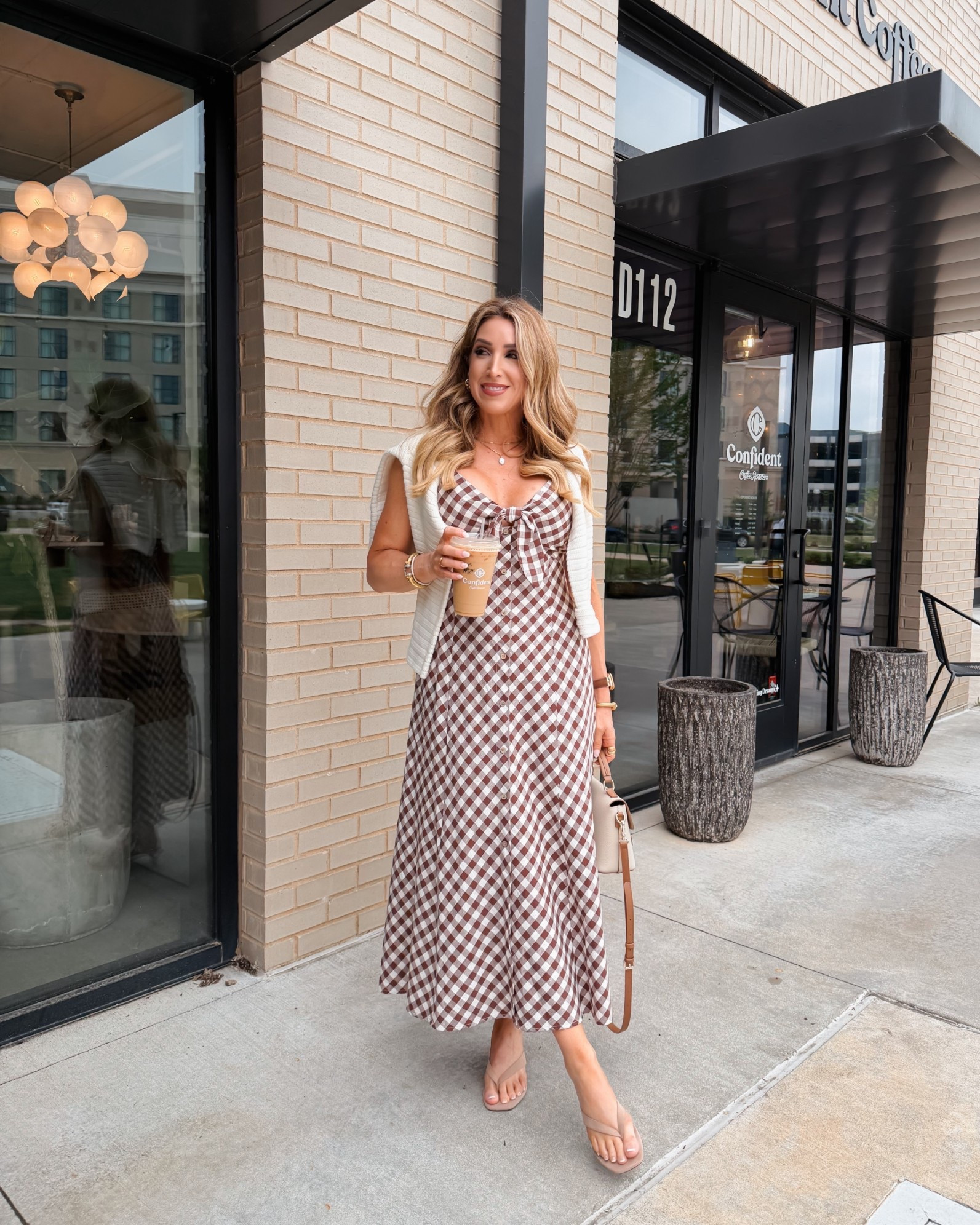 Chocolate brown gingham sundress for spring and summer. Pockets! 👏🏼

Spring outfits 2026, summer outfits 2026, midi dress, vacation dresses, summer dresses, sandals 

#LTKSeasonal #LTKMothersDay #LTKdayinmylife