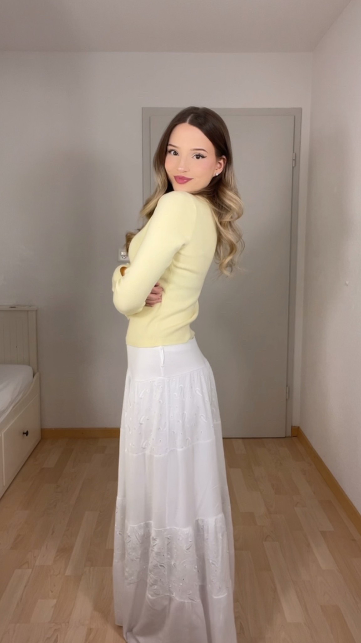 Soft butter yellow for spring—I’m officially obsessed! This fitted pastel sweater paired with a flowy white embroidered maxi skirt is such an easy way to look polished while feeling comfy. I styled it with a cream shoulder bag and white shoes to keep the tones light and breezy. This outfit is giving quiet luxury meets sunny picnic day energy. So simple, so soft, so spring.

#LTKspring #butteryellow #pasteloutfit #springfashion2025 #quietluxurystyle #softaesthetic #minimalromance #LTKeurope #femininefashion #springoutfitideas #neutralstyle #lightlayers #modeststyle #springinspo #elegantcasual #preppyaesthetic #whiteaesthetic #LTKunder100 #easyelegance #butteryellowtrend
