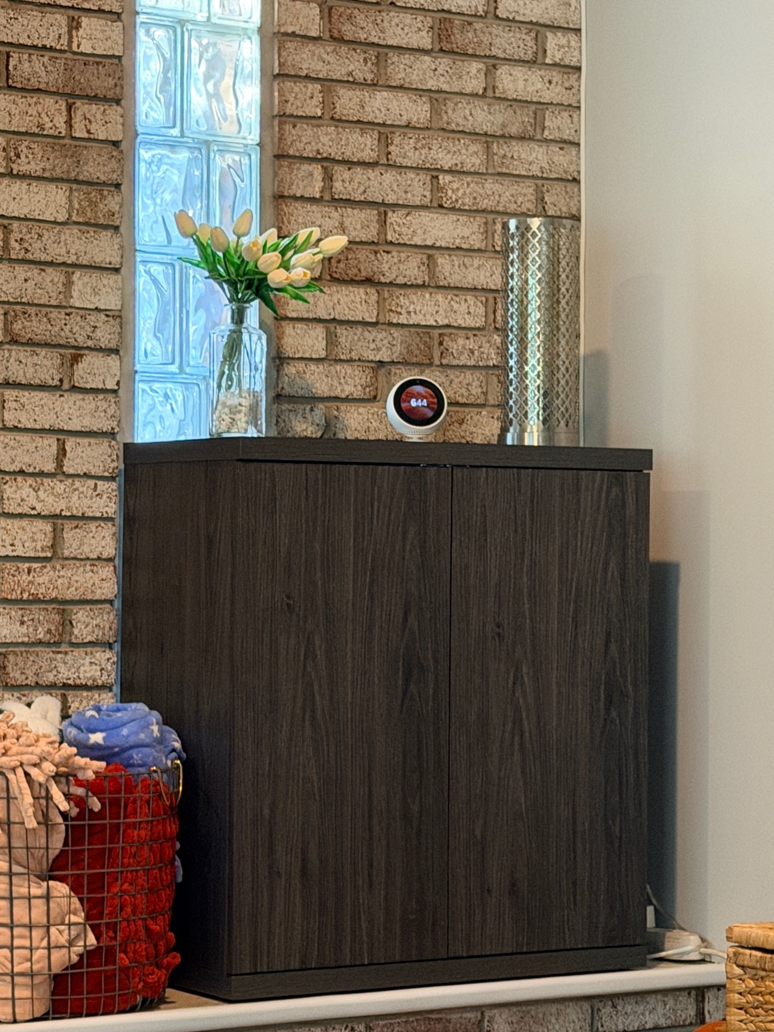 This cabinet keeps the toys and kid crafts out of sight but within reach for my 3 year old. She gets to have her treasures nearby for playing and I get a living room that looks like an adult actually lives here.

#LTKdayinmylife #LTKmomlife #LTKHome