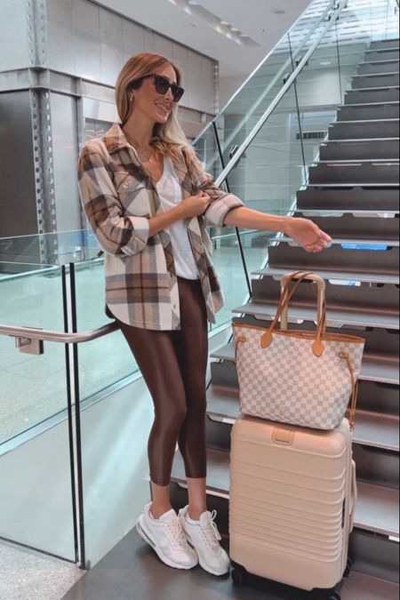 One of my favorite airport outfits 

The leggings are ultra comfortable, stretchy and flattering! They fit true to size, I am wearing a size small on them.
.
 the sneakers are comfortable and they also fit true to size.

#LTKstyletip #LTKshoecrush #LTKtravel