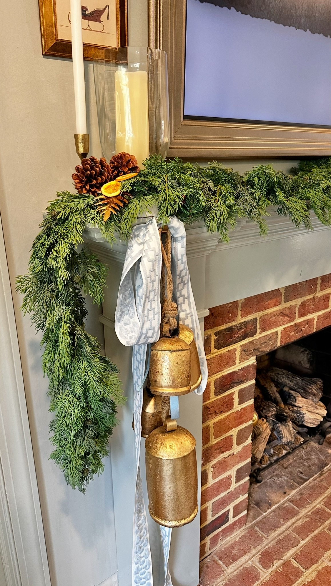 I love adding a little variety and texture to my mantle decor, and these cascading gold bells do just that. ✨ They bring a touch of shimmer and movement against the greenery — such an easy way to make your holiday mantle feel layered and collected. I have them hanging from one side for a slightly asymmetrical look, and I love how they catch the light at night. 🌙
Find the bells and the rest of my mantle details linked below from @wayfair.
#ad #WayfairPartner #Wayfair #HolidayDecor #LTKHome 

#LTKHoliday #LTKSeasonal