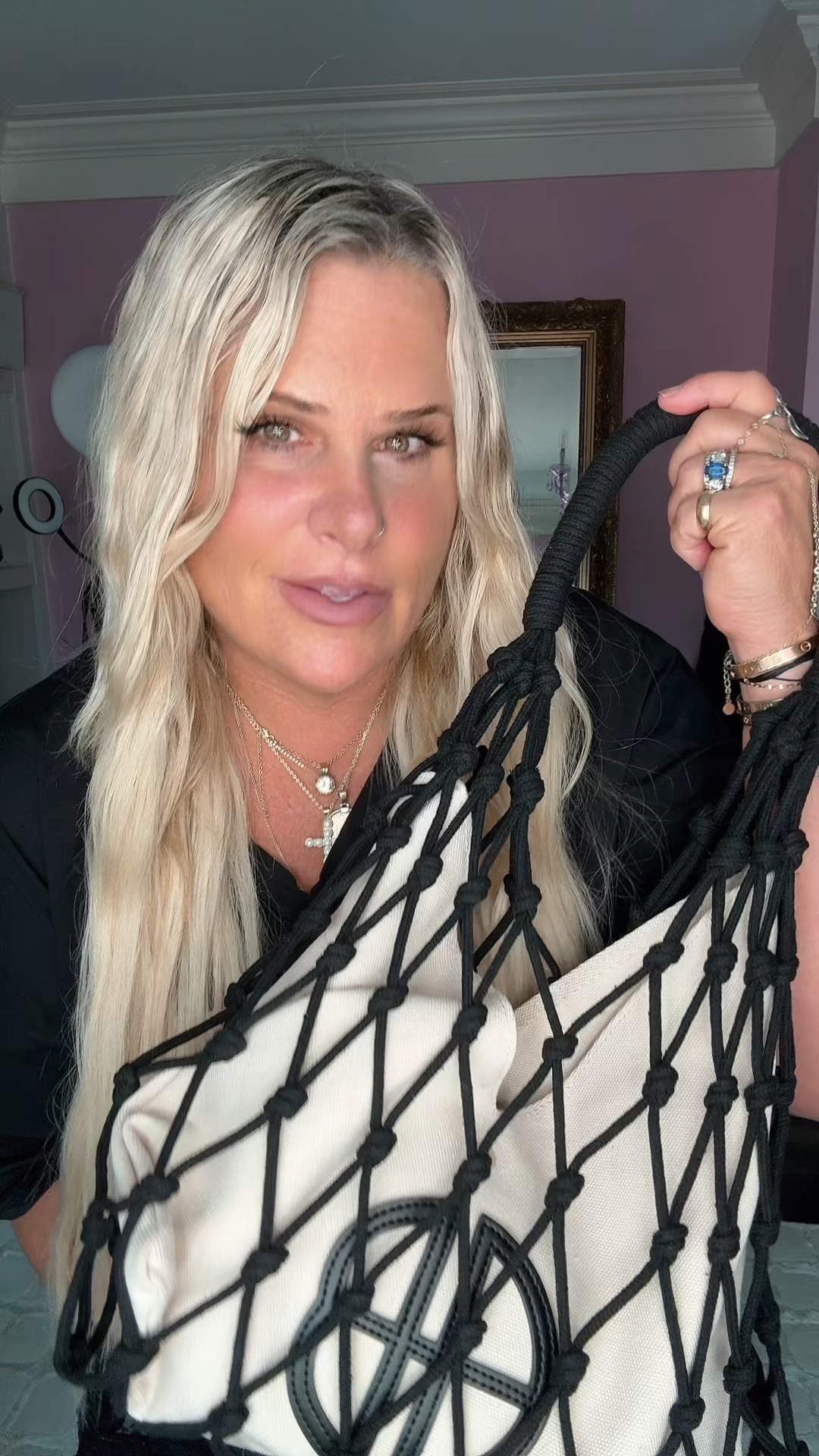 I love this bag. It is giving Designer vibes if you know you know. it’s also super comfortable on the shoulder and holds a lot. loving these Moto boots they are wide calf, friendly and love the style of the jersey with the lace skirt. 🖤

#LTKMidsize #LTKStyleTip #LTKOver40