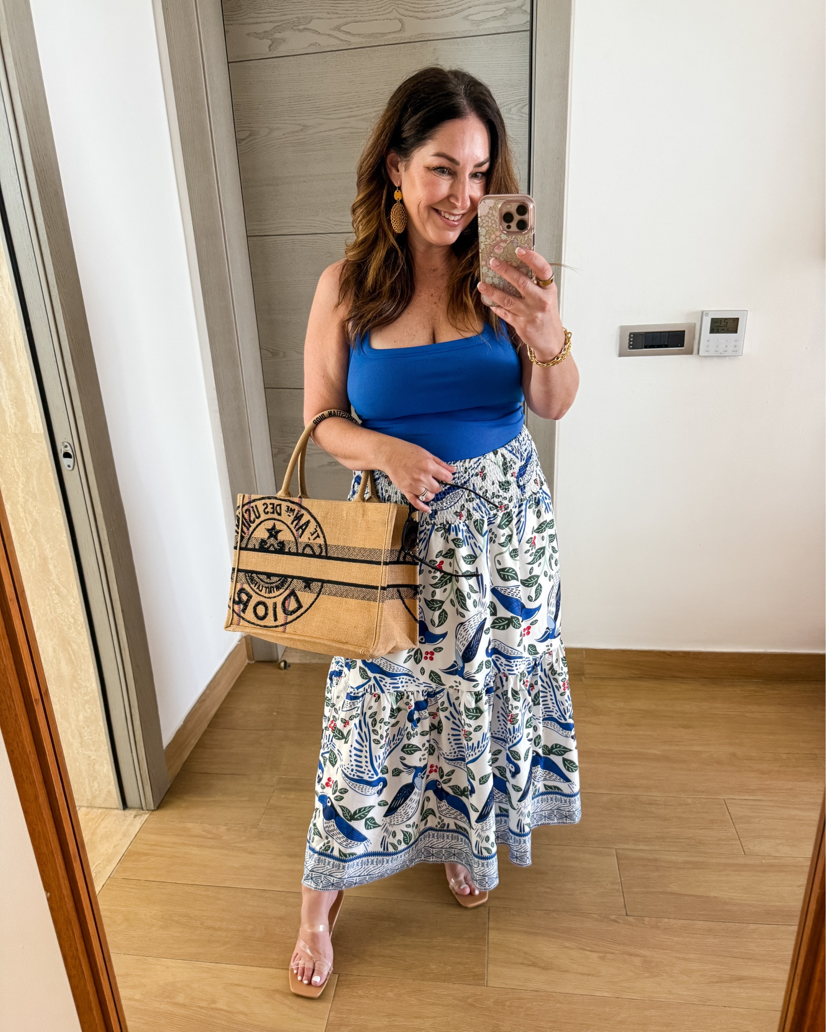 Amazon delivered with these beach essentials: a boho skirt, sandals, and this chic Dior tote. Perfect for our Punta Cana trip! Wearing L in both #beachstyle #travelready 

 