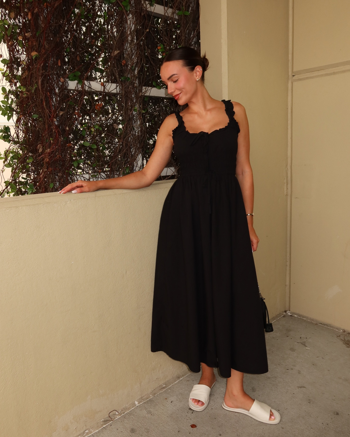 This black summer dress is perfect to dress up or dress down, whether you’re on vacation or heading out to brunch with the girls!

The ruffle details and adjustable ties make this both cute and comfy to wear all day. 