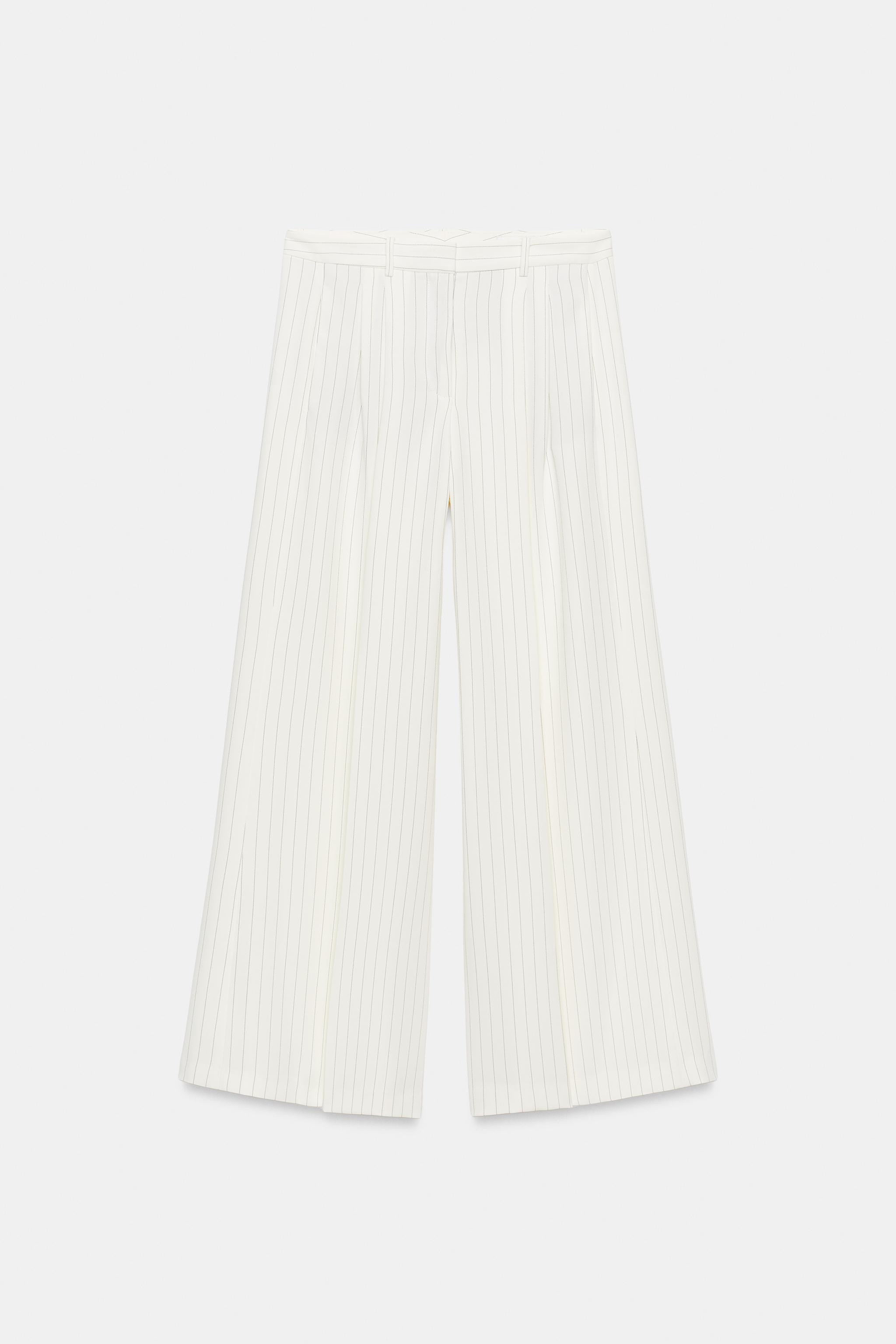 ZARA WOMAN COLLECTIONMid-rise pants with belt loops. Side pockets and back welt pockets. Front pl... | Zara US
