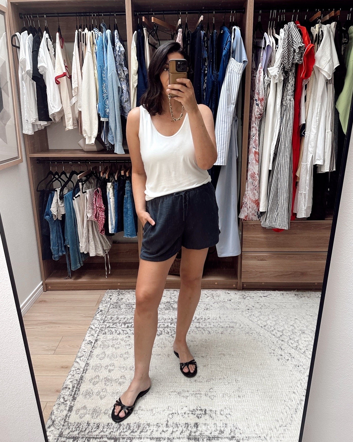 I wanted a tank top that wasn’t a ribbed high neck tank top so I looked around and found this one! This is a modal fabric, so it’s that slinky feel. It runs TTS to me, I’m in the large. It’s slightly sheer, but with a nude bra it’s ok. Lightweight and airy! A nice basic for under $20.