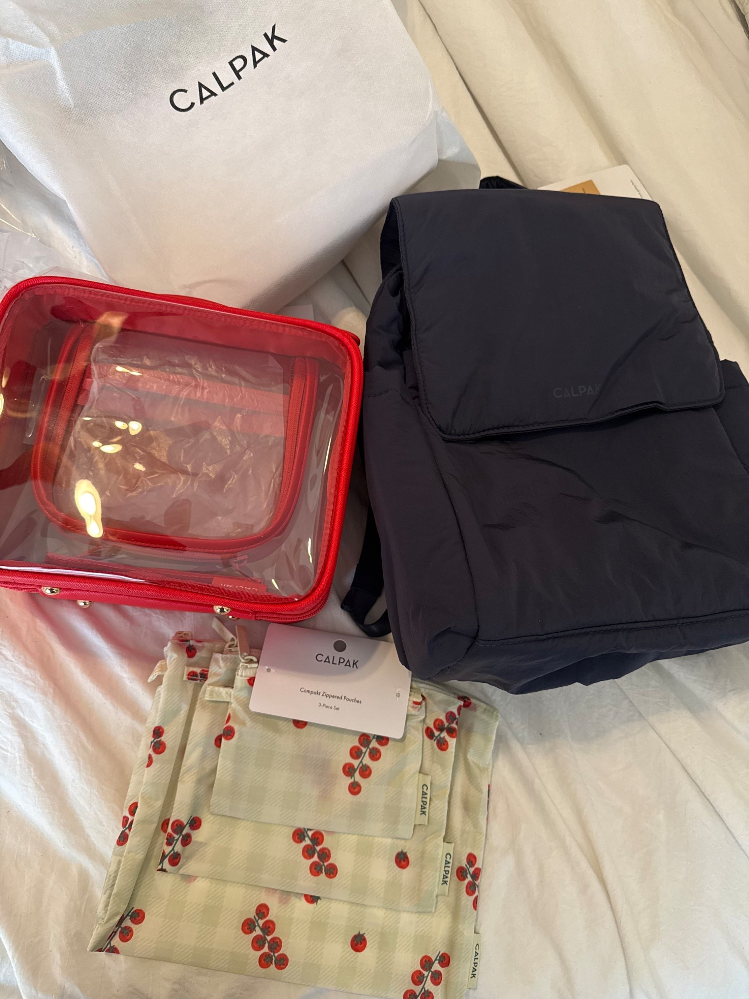 CALPAK mini diaper bag, tomato red toiletry travel bag, and their pouches that are amazing for organizing ❤️

Perfect little set for on-the-go mama- so excited to use these for our soccer days ⚽️🥅