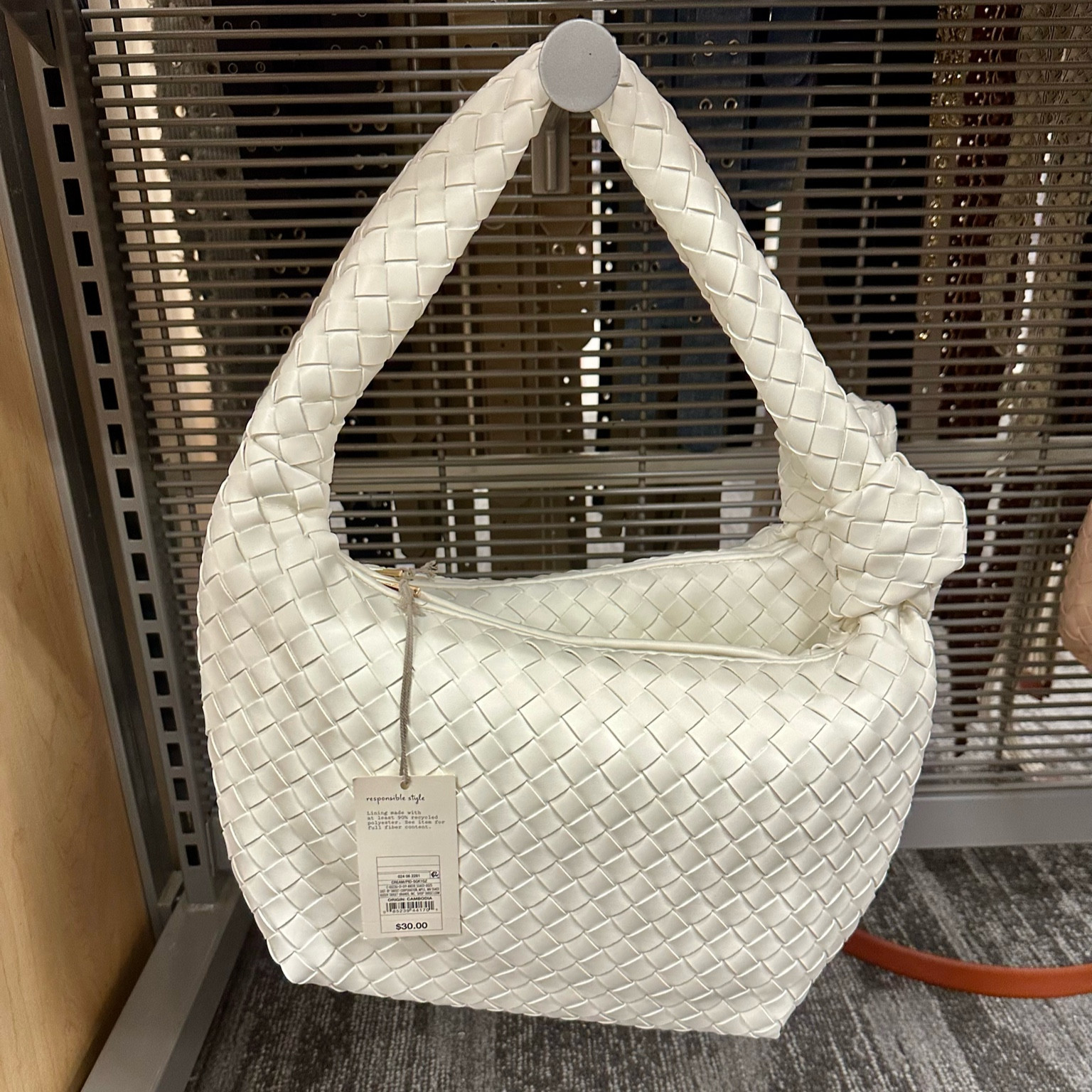 This weaved designer lookalike purse at Target is literally drool worthy! Sooo good and a nice bigger size!!! 

#LTKitbag #LTKfindsunder50 #LTKtravel