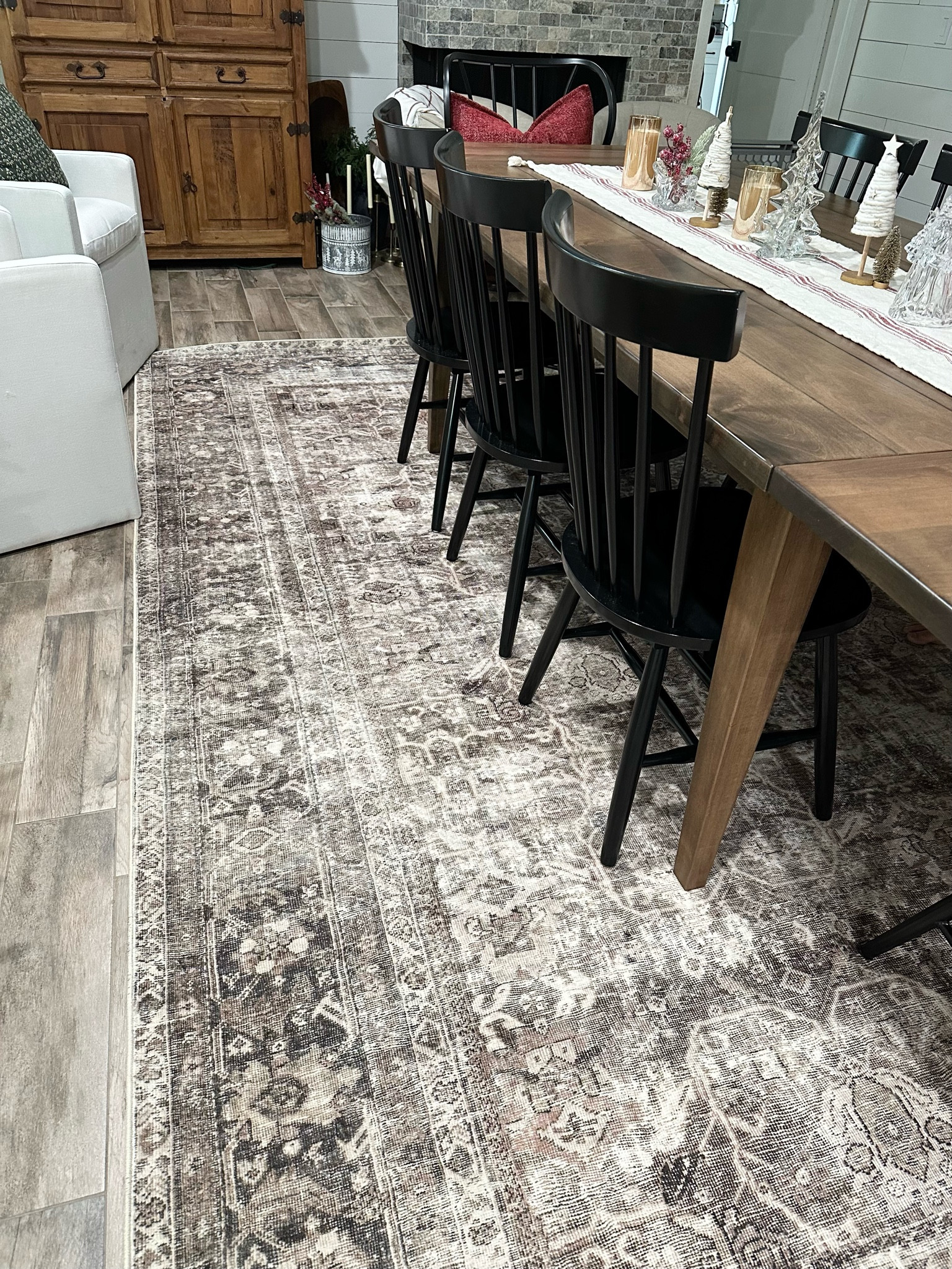 Black dining chairs, wood table, neutral area rug, loloi area rug 8 by 10

#LTKsalealert #LTKCyberWeek #LTKhome