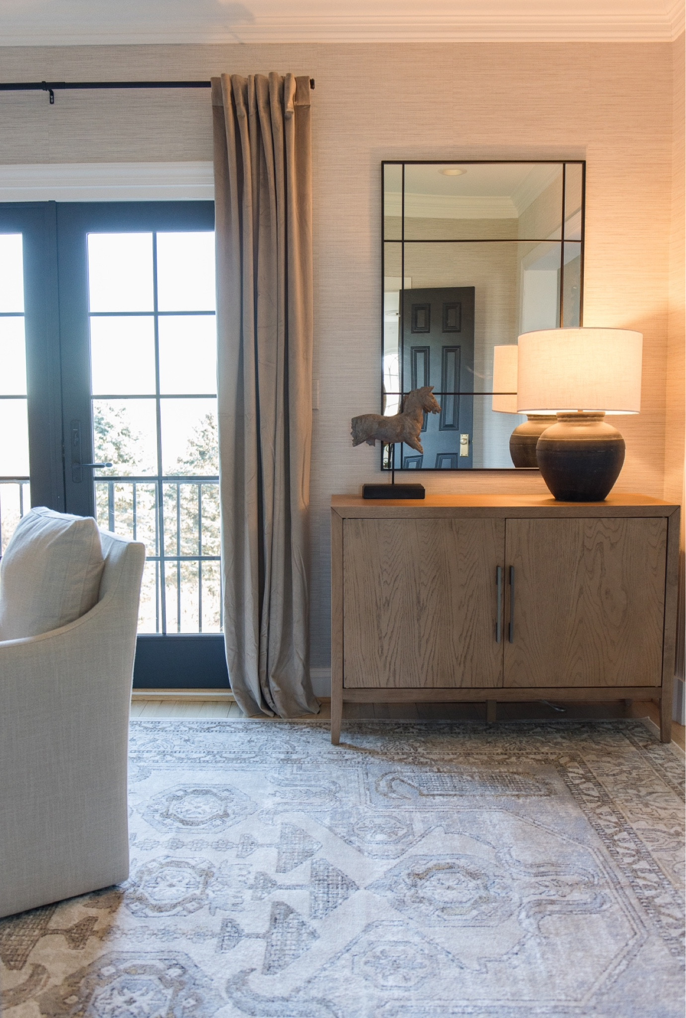 Love this cabinet, velvet drapes and black mirror!

#LTKhome #LTKsalealert #LTKstyletip