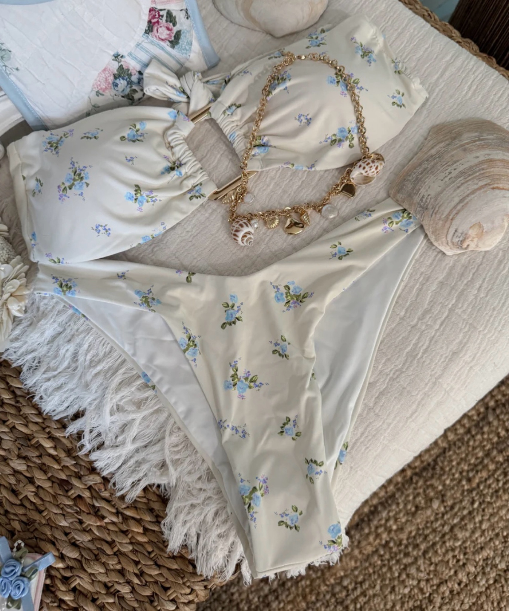 Ocean breeze ready 🌊💙 This white and blue floral bathing suit brings classic charm with a fresh, coastal twist—perfect for soaking up sun in style on the beach 

#LTKSeasonal #LTKTravel #LTKStyleTip