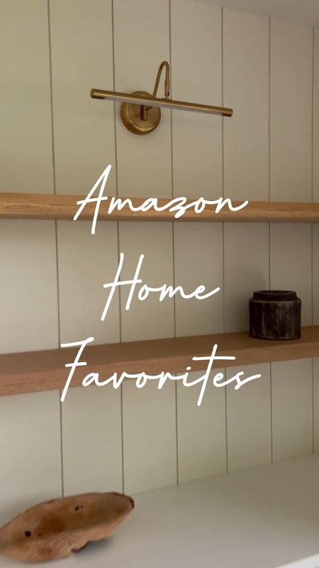 Amazon home favorites include these modern brass picture light sconces, Frame TV, neutral area rug, waffle weave blanket, faux pampas stems and faux olive tree #amazonfinds #amazonhome #affordabledecor

#LTKhome #LTKFind #LTKxPrimeDay