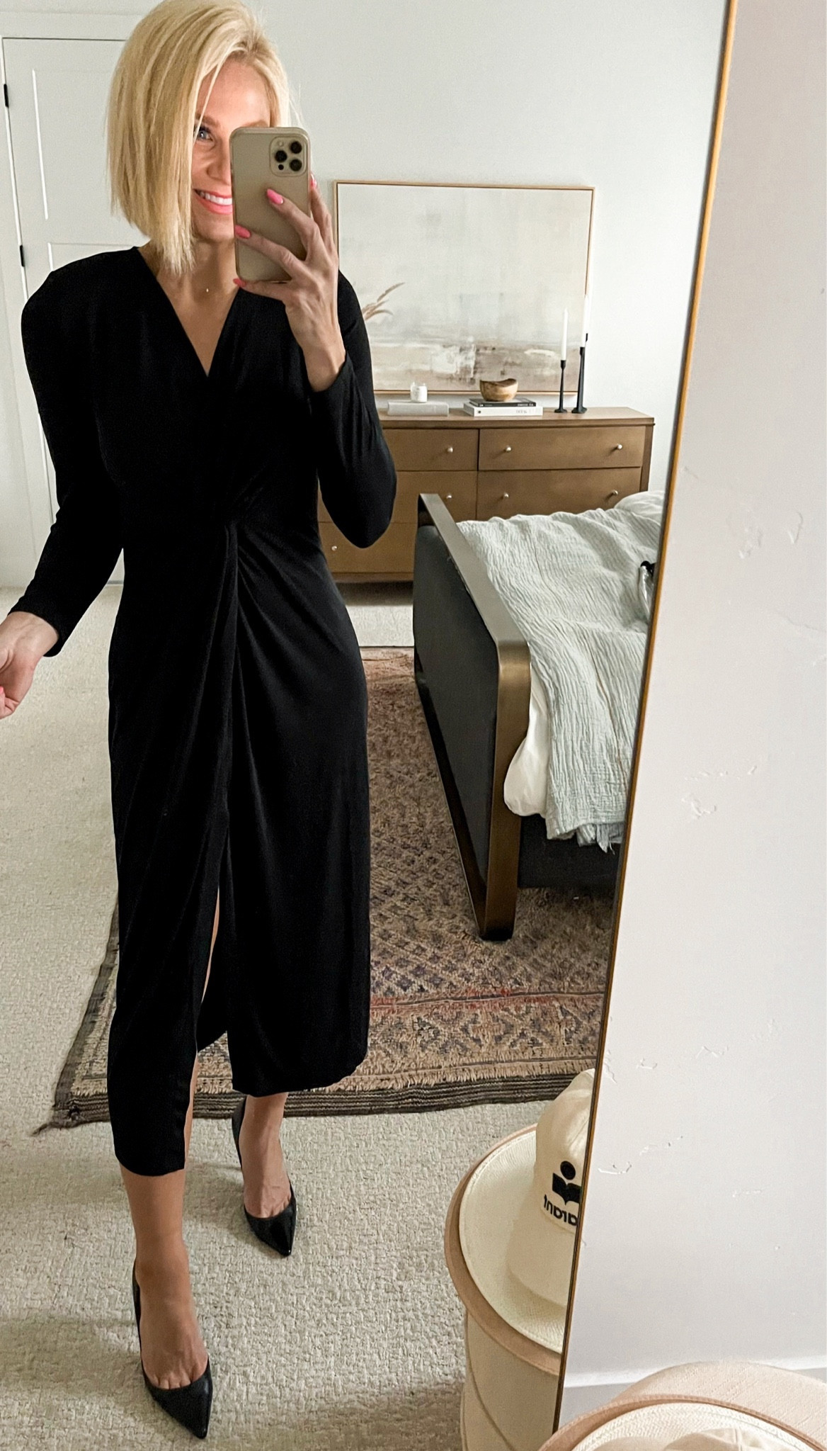 Budget friendly dress! The v neck + twisted detail across the waist is so flattering! Mid length with a slit up low-mid thigh. Simple, lbd!
Wearing a small. 
Stocked in all sizes!

#LTKSeasonal #LTKHoliday #LTKHolidaySale