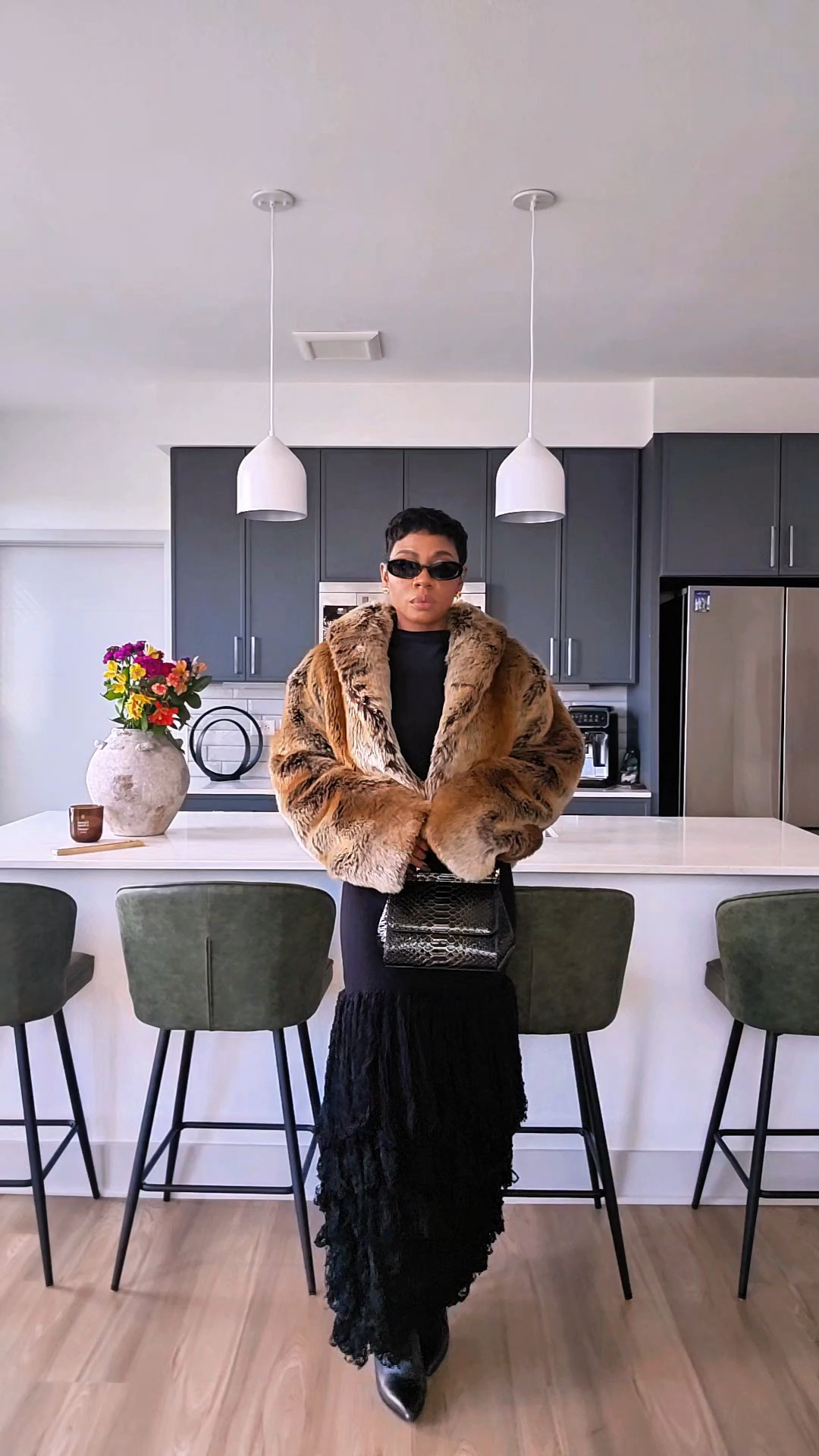 Valentine’s Day Outfit Idea (No Pink or Red)Valentine’s Day outfit idea for the girls who don’t do pink or red I wanted this look to feel romantic but still grown.  elevated, confident, and wearable for dinner or a night out.The faux fur coat is from Revolve and it instantly makes the outfit feel luxe, while the fringe skirt adds movement and keeps it interesting.Styling tip: when you’re wearing all black, mixing textures (like faux fur, fringe, and sleek accessories) adds depth and prevents the outfit from feeling flat or boring.Valentine’s Day, Date Night, Chic, Elegant Outfit

#LTKValentine #LTKgrwm #LTKPetite