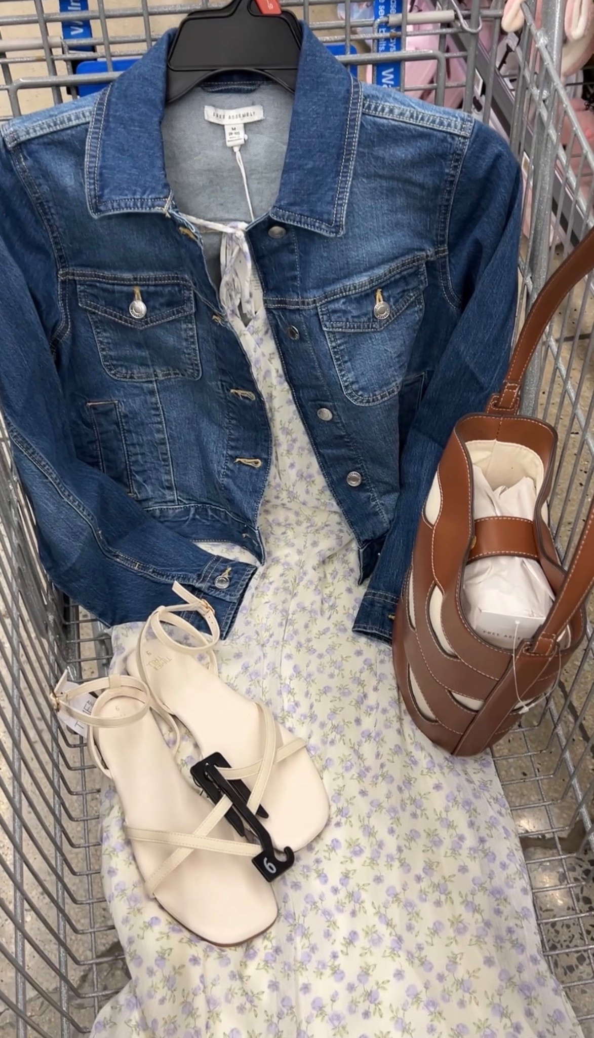 Walmart spring outfit idea with this $19.98 flutter sleeve dress and denim jacket. Dress it up or down, you could also add a cardigan. I went up one size to a medium in both pieces. #walmartfashion #walmartfinds Easter dress floral family photos 