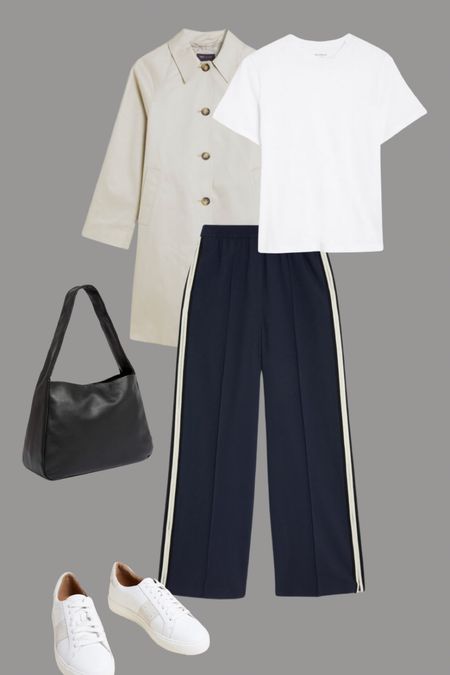 Side stripe trousers in navy and cream with a cream car coat , a simple white tee, flats and a leather bag