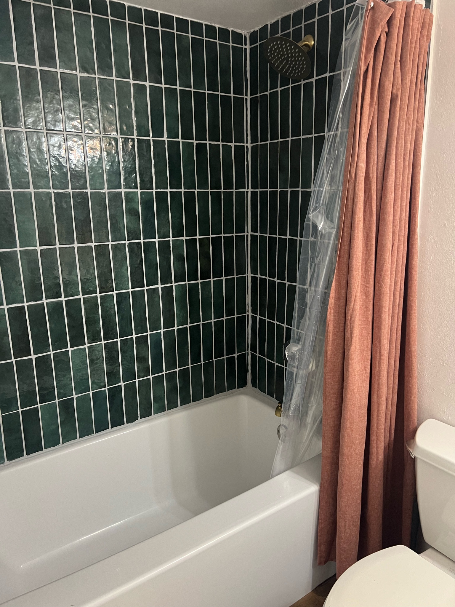 Our shower tile + tub! Both from Home Depot! Shower head + faucet system from Amazon. Shower curtain from Target. 

#LTKHome