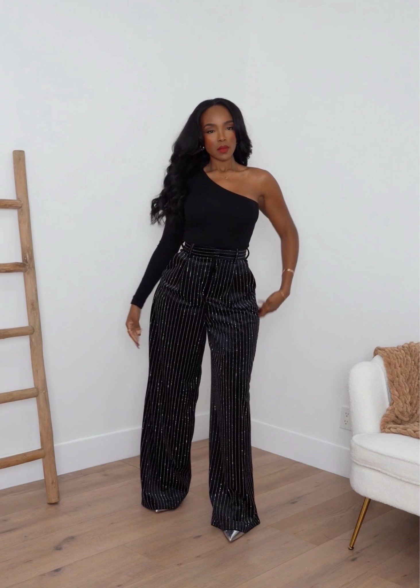 A sleek one-shoulder moment paired with sparkle-striped wide-leg pants — the perfect mix of minimal and festive. An elevated holiday look that feels dressy without trying too hard, and the fit is so flattering.

Perfect for holiday parties, winter celebrations, and chic night-out plans.

one-shoulder top outfit styling, holiday wide-leg pants look, elevated black outfit ideas, night-out glam outfits, minimal chic holiday fashion.

📏 Sizing: Top (Small) • Pants (Small) • Heels (TTS)
Measurements: 5’4” · 138 lbs · 34D · 27” waist · 40” hips

✨ Everything linked below for easy shopping

Follow me on Instagram and YouTube @kirasfashionfinds

#LTKPetite #LTKootd #LTKHoliday