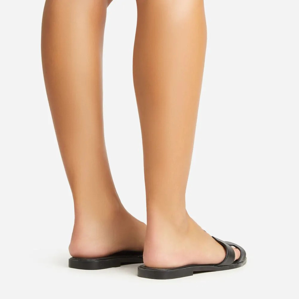 Addison Caged Flat Slider Sandal In Black Faux Leather | EGO (UK)