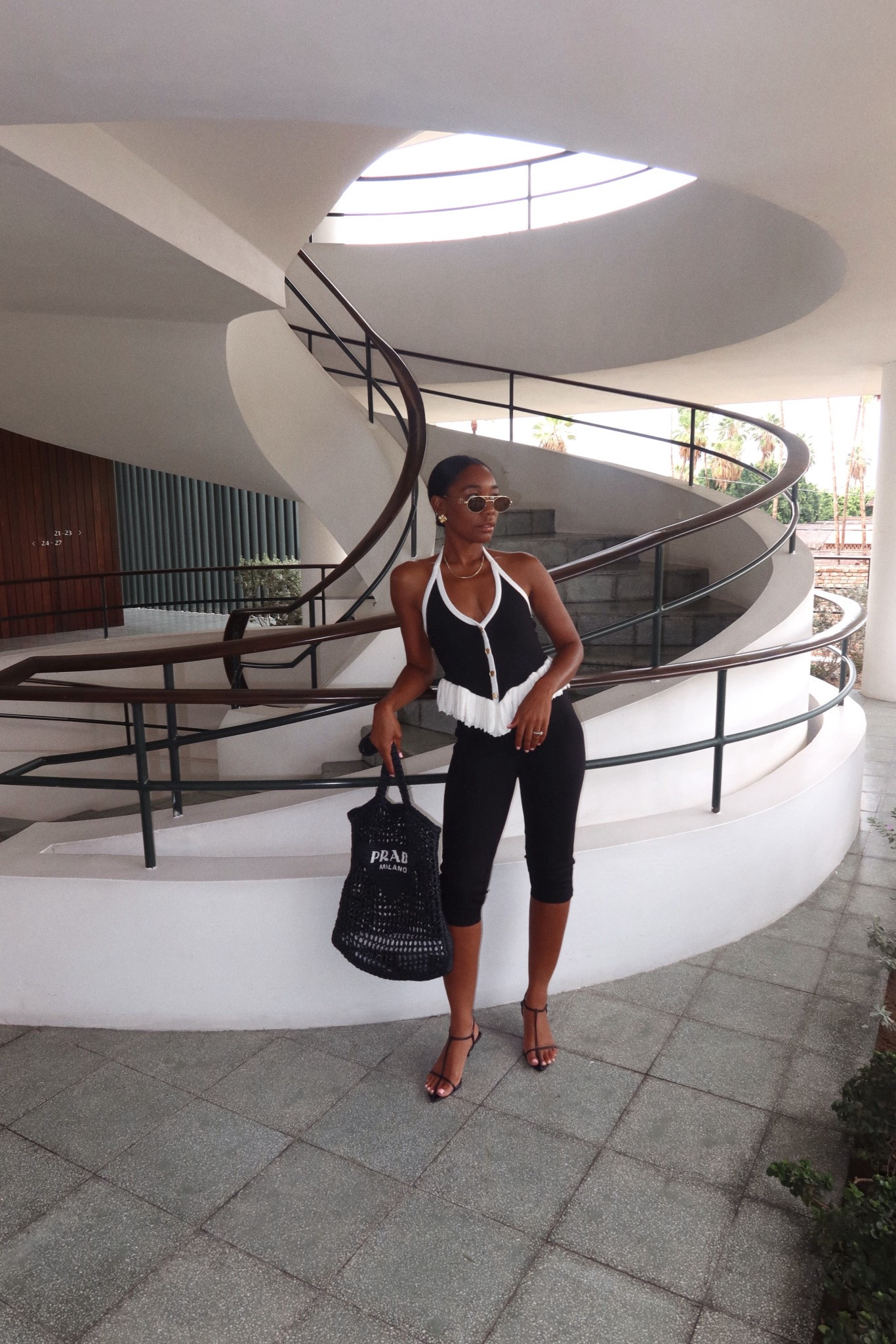 Black and white halter top, capri pants 

#LTKCon #LTKStyleTip #LTKTravel