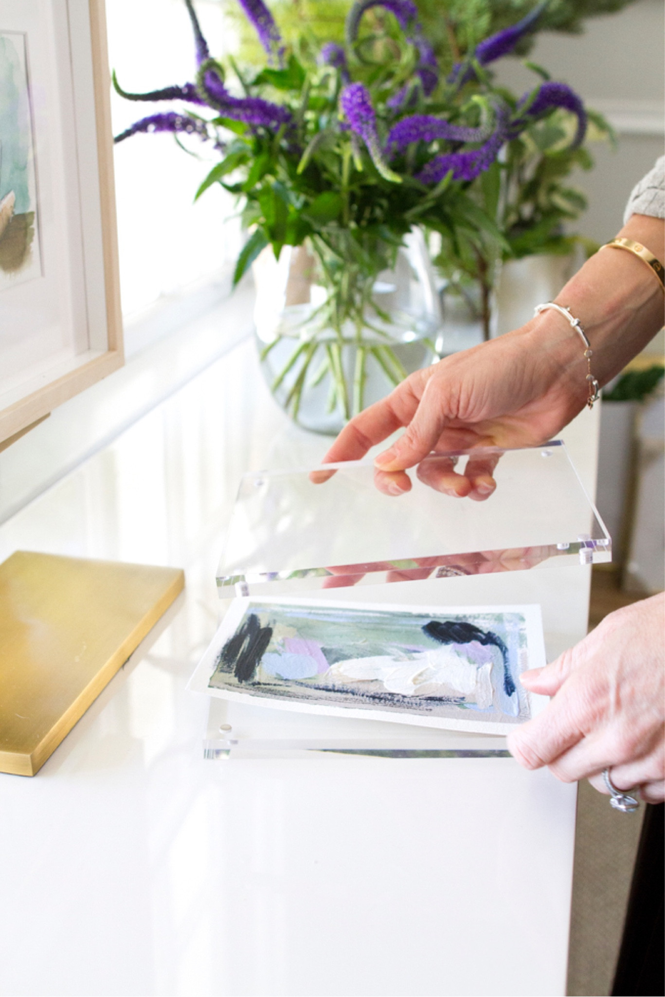 Acrylic magnetic frames are perfect for framing smaller pieces of art. They stand beautifully on a bookshelf or console table 

#LTKstyletip #LTKFind #LTKhome