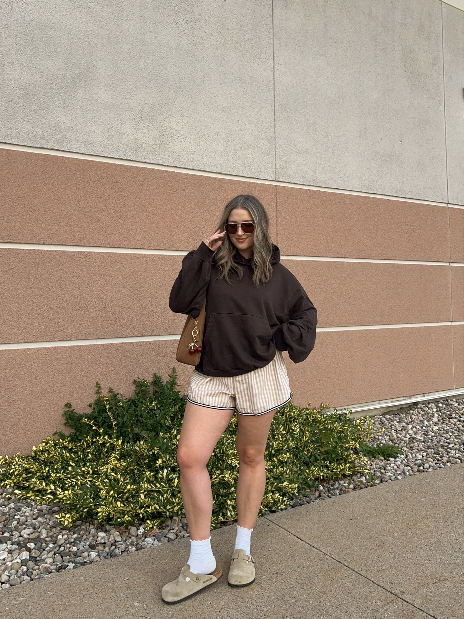 Comfy early fall outfit! Wearing M in the chocolate brown hoodie. Wearing L in the striped boxer shorts but should have done M (exact Canadian shorts link under “similar products”). I’m a 9.5-10 shoe and wear a 40 in the Birkenstock clogs

#LTKfall #LTKsale #LTKmidsize