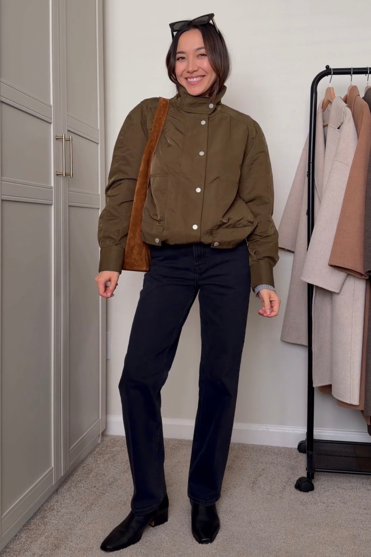 A simple chic transitional spring outfit 

Avec de filled bomber jacket — small 
Aritzia Arlo jeans — regular inseam 
Steve Madden boots 
Quince suede bag 

#LTKootd