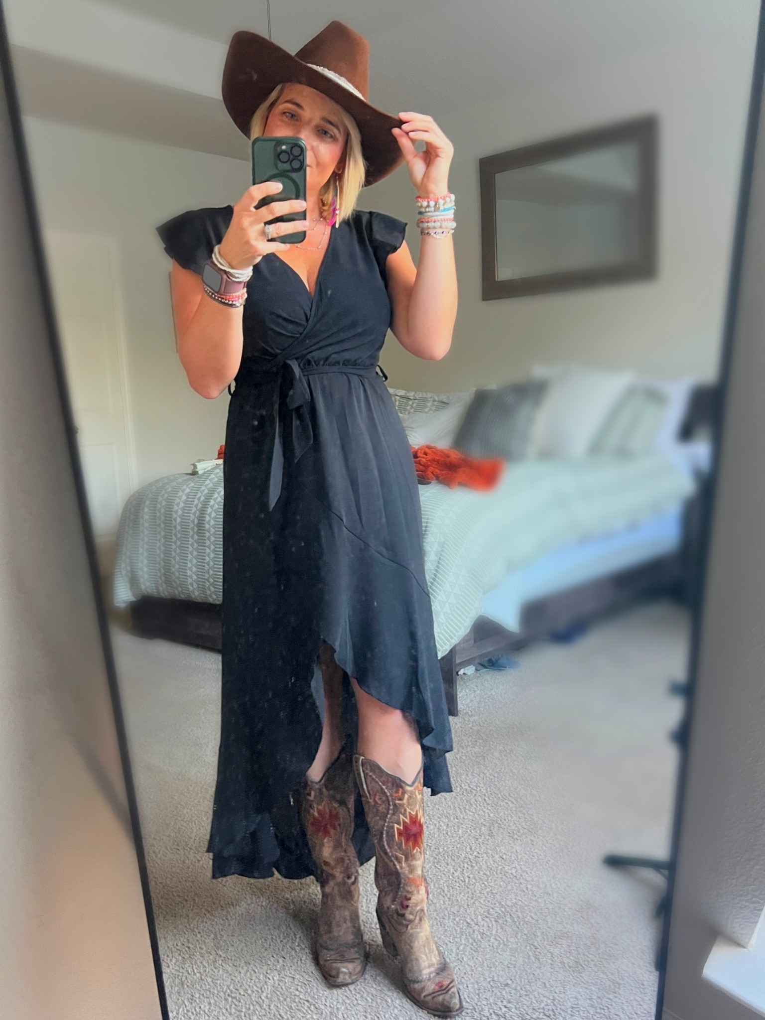 Cowgirl chic, Amazon sleek 🤠🖤
This wrap-style black dress from Amazon has the perfect flow for boots-and-brunch days or country nights.
Styled it with my well-worn Cavender’s boots and topped it off with a custom hat I designed myself — a little bit rugged, a little bit glam, and totally me. 

#LTKStyle #LTKFashion #LTKFinds #AmazonFashionFinds #AmazonDress #CowgirlStyle #WesternVibes #SouthernStyle #OOTD #CountryChic #CavendersBoots #CowgirlCharm #WesternFashion #LTKOutfitInspo #LTKUnder50 #LillyKsHouseOfCharm

#LTKStyleTip #LTKBeauty #LTKFindsUnder50