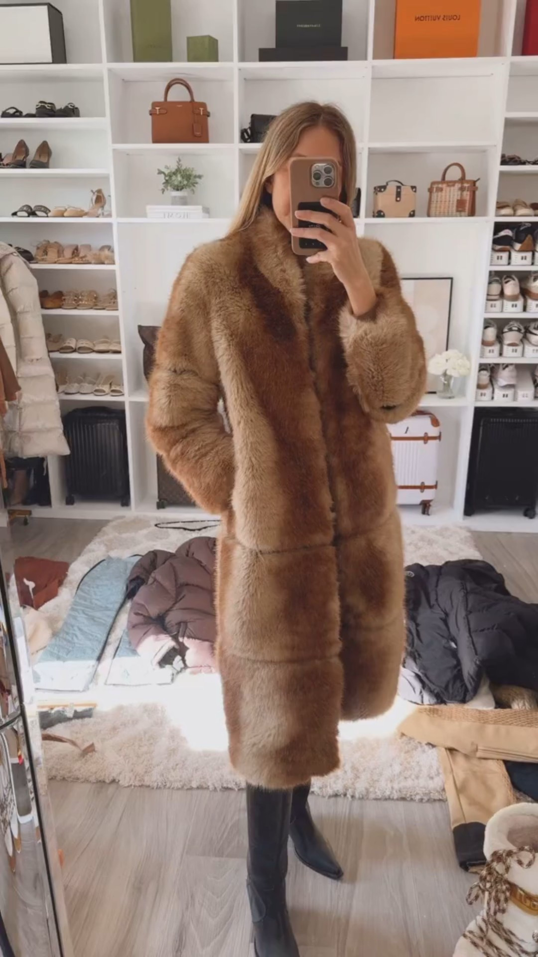 Definitely taking this fur coat for my winter trip! Warm and elegant, this coat elevates any casual outfit and it’s perfect for staying comfortable and warm in the winter. Runs true to size I’m wearing size small 
Coat
Winter outfit 
Winter coat 
Snow outfit 

#LTKU #LTKootd #LTKSeasonal