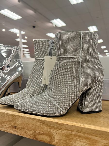 These Women's Cailin Ankle Boots from A New Day™ in a sleek silver rhinestone! ✨⚡️ The perfect blend of style and comfort, these boots are a must-have for any wardrobe. Pair them with your favorite jeans or a chic skirt for an effortlessly trendy look. Boot Season, Fashion Finds, BrandiKimberlyStyle, shiny boots, holiday style 

#LTKGiftGuide #LTKSeasonal #LTKHoliday