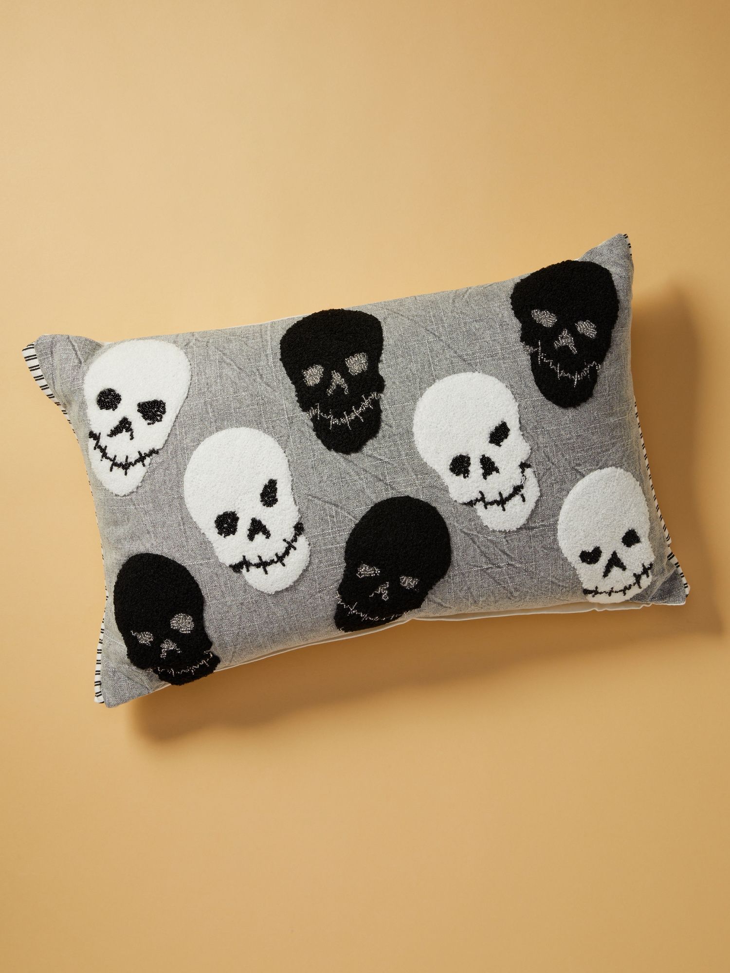 Made In India 14x22 Tufted Skulls Pillow | Halloween | HomeGoods | HomeGoods