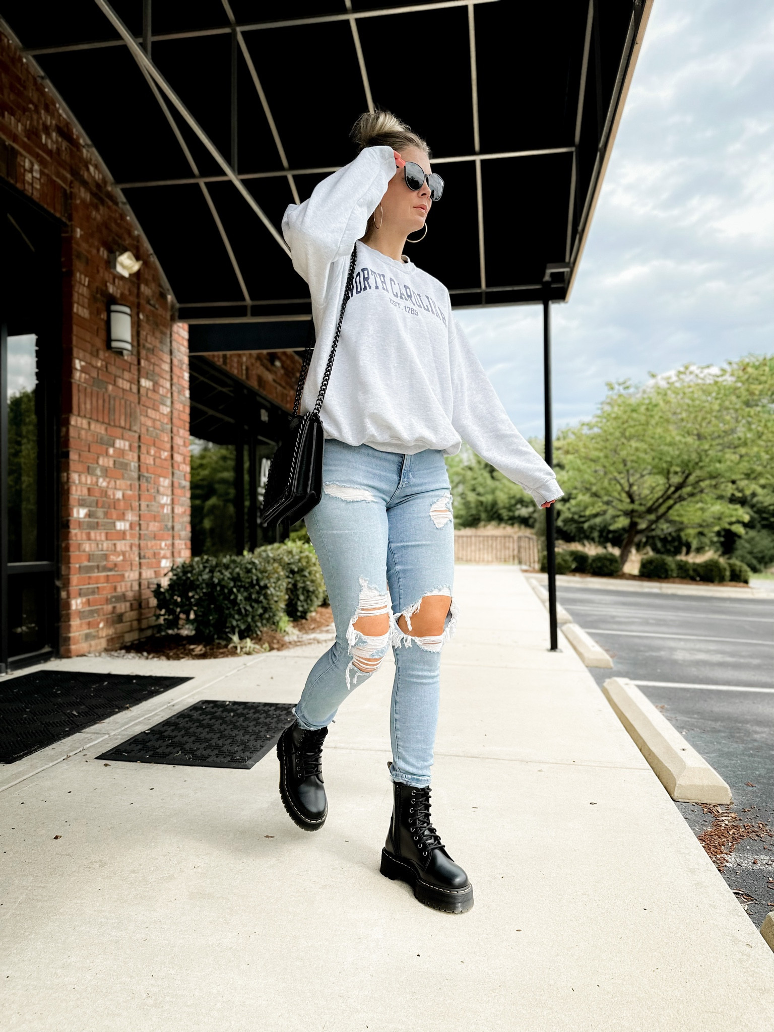 Doc marten spring & summer outfit idea. Get your normal size in all items!! 

leather jacket - Dr. Marten boots - jeans - tote bag - edgy look

#LTKunder50 #LTKFestival #LTKshoecrush